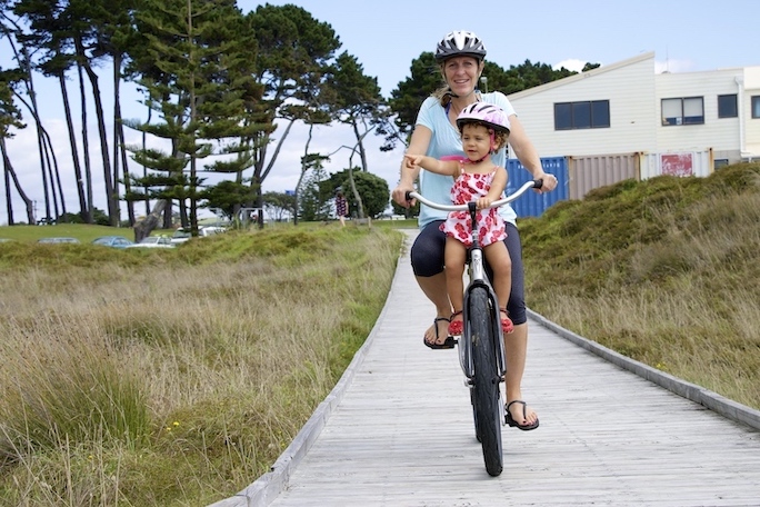 Mother and Daughter Cycle Together Using a Copilot Baby Bike Seat